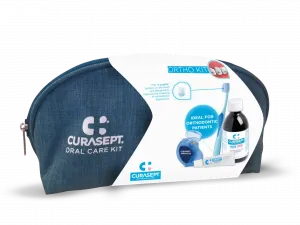 Набір Curasept Ortho Kit (ополіскувач 200 мл + зубна паста 5 мл + зубна нитка + зубна щітка + косметичка)