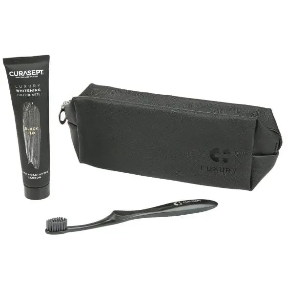 Набір Curasept Whitening Luxury Black (зубна паста 75 мл + щітка + косметичка чорний колір)