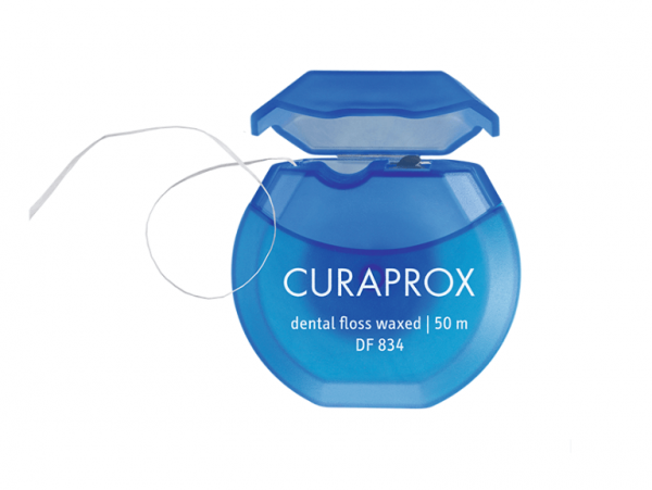 Зубна нитка Curaprox DF 834 вощена з ароматом м`яти (50 м)