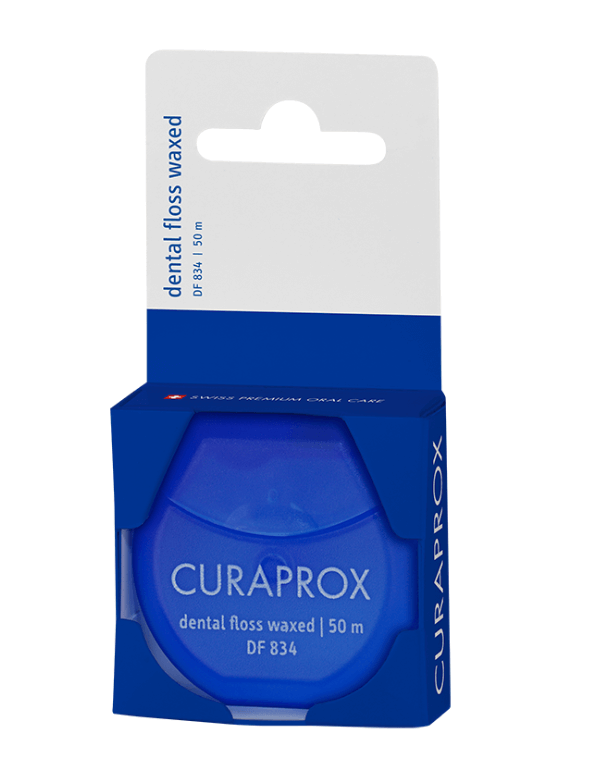 Зубна нитка Curaprox DF 834 вощена з ароматом м`яти (50 м)
